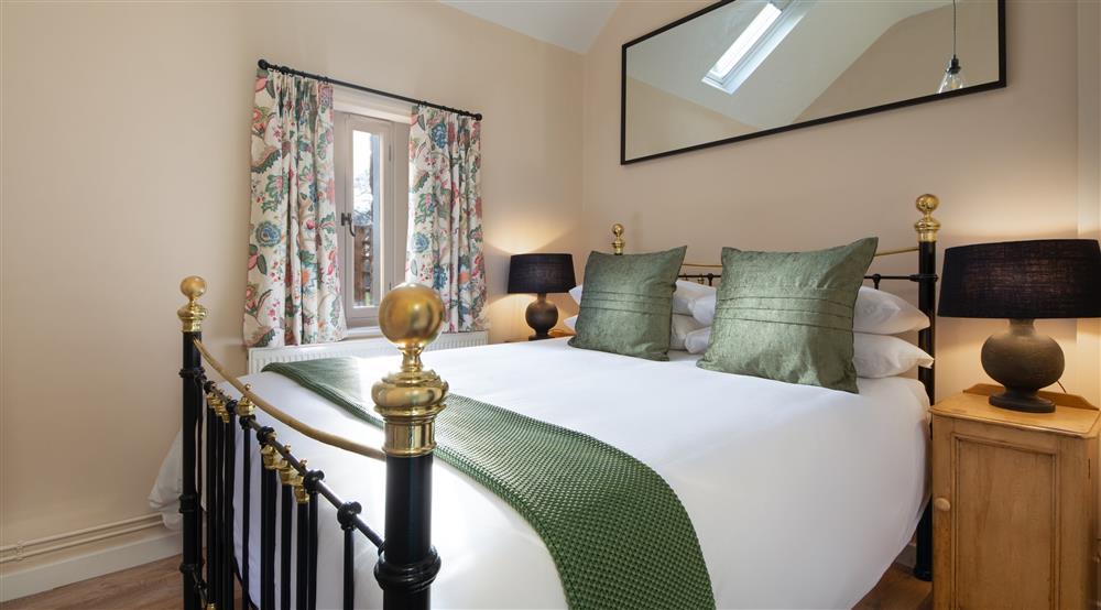 The king-size bedroom at Kymin Stables in Monmouth, Monmouthshire