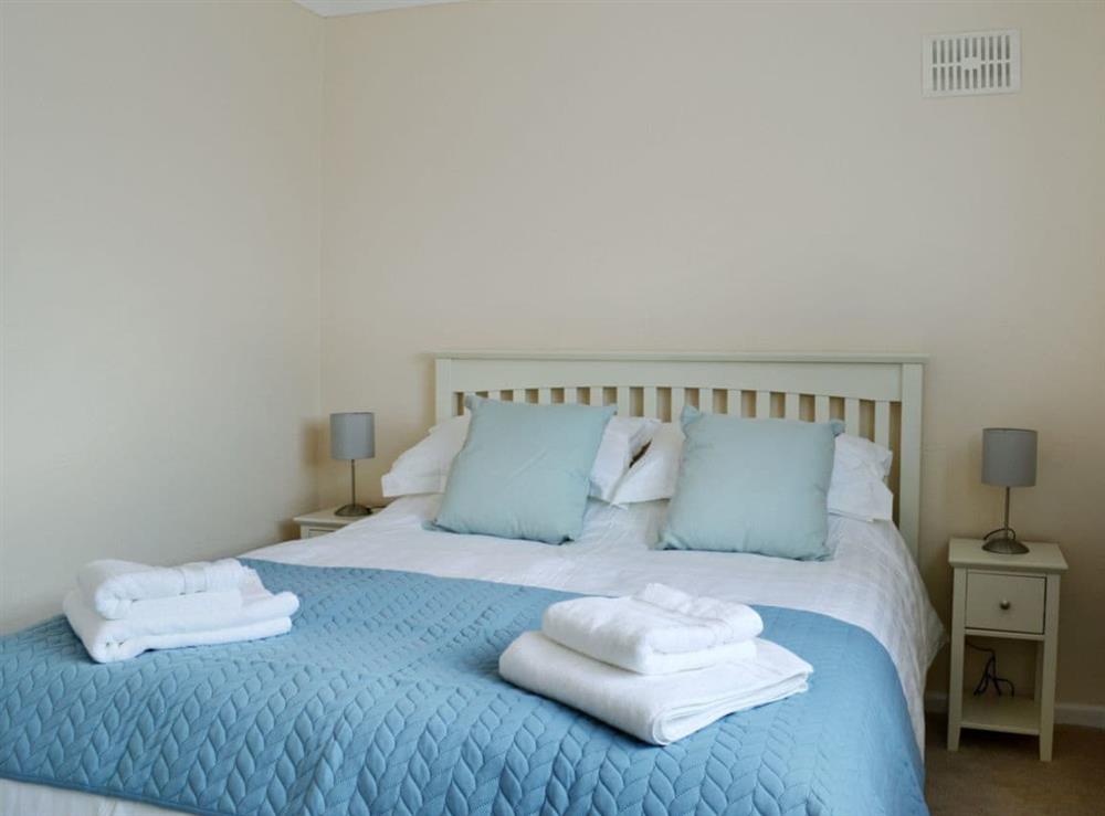 Charming double bedroom with kingsize bed at La Falda in Sutton-on-Sea, near Skegness, Lincolnshire