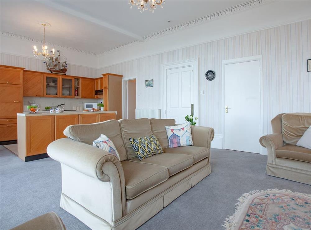 Open plan living space at La Fortuna apartment in Teignmouth, Devon