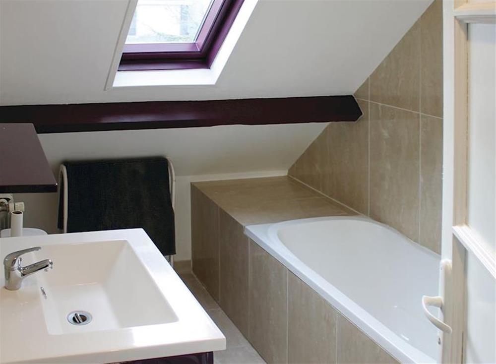 Beamed bathroom with sloping ceiling at La Maison Blanche in Bénodet, Brittany, France