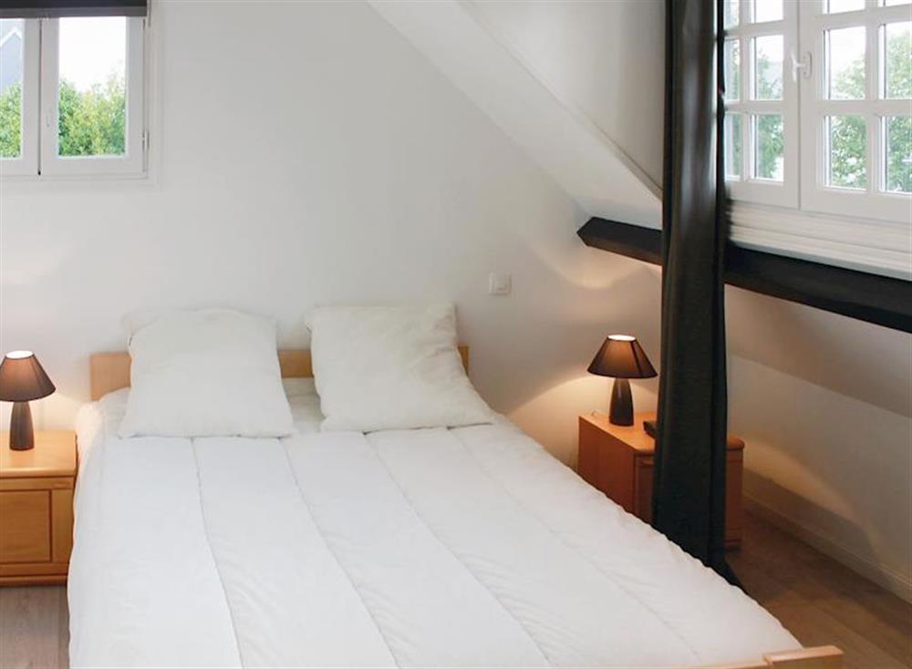 Comfortable double bedroom at La Maison Blanche in Bénodet, Brittany, France