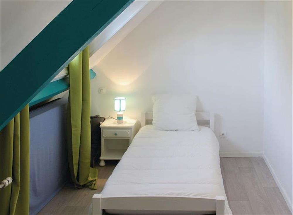 Second floor bedroom  with single bed and Velux window at La Maison Blanche in Bénodet, Brittany, France
