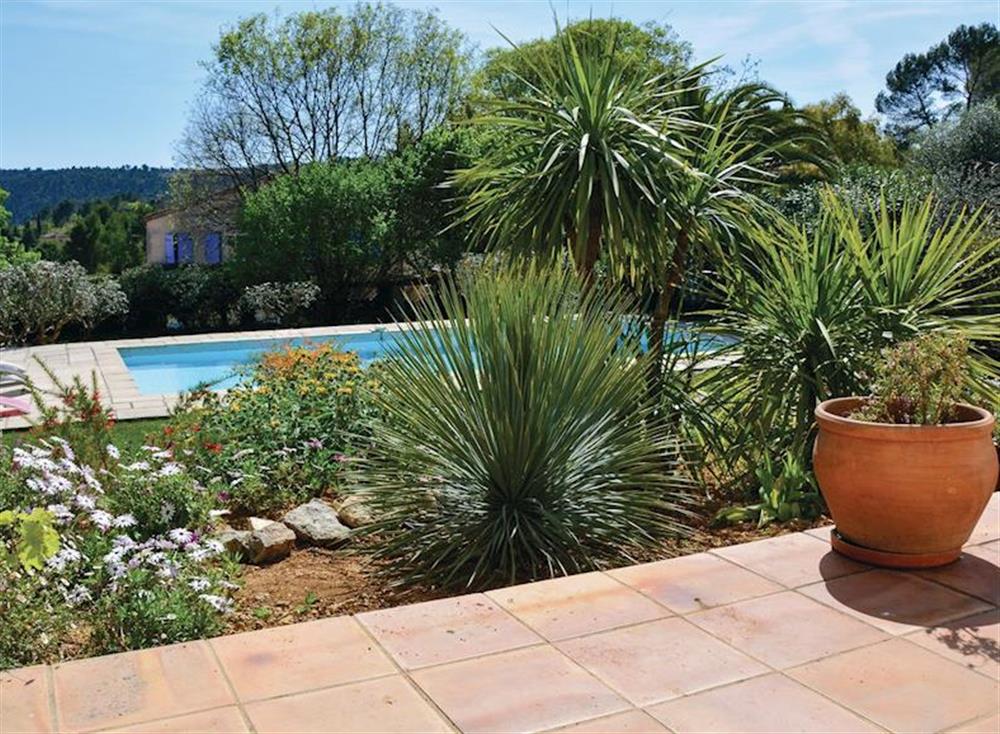 View of pool from patio at La Maison Charmante in Grasse, Côte-d’Azur, France