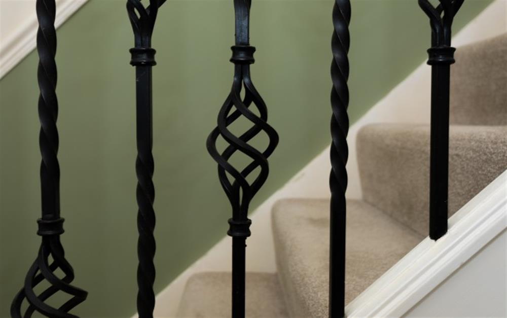 The spindles on the stair bannister look very stylish. at La Mouette in Falmouth