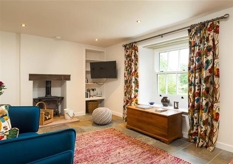Relax in the living area at Lacet Cottage, Hutton