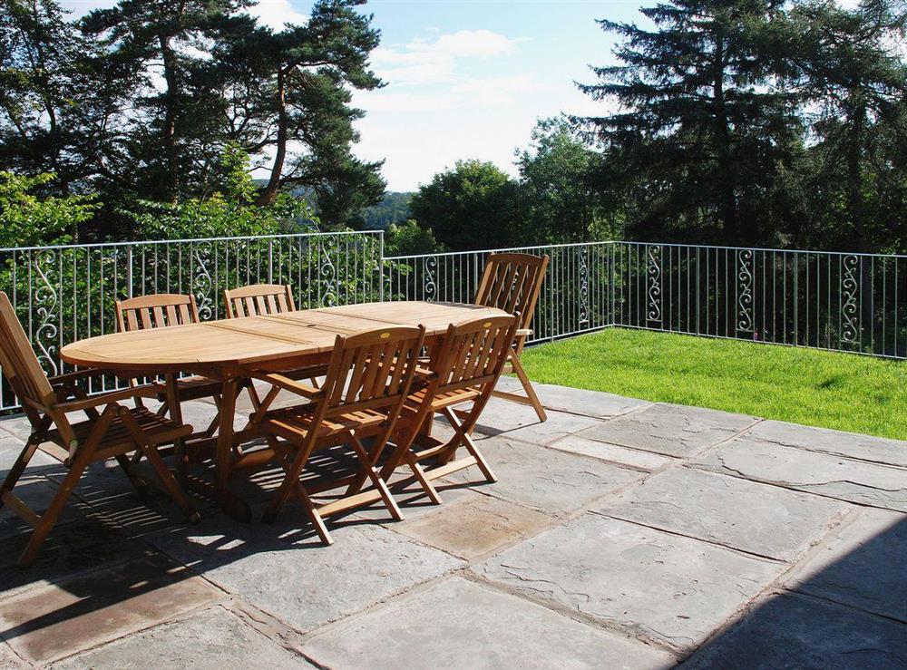 Al fresco dining can be enjoyed on the flagged and grassed terrace