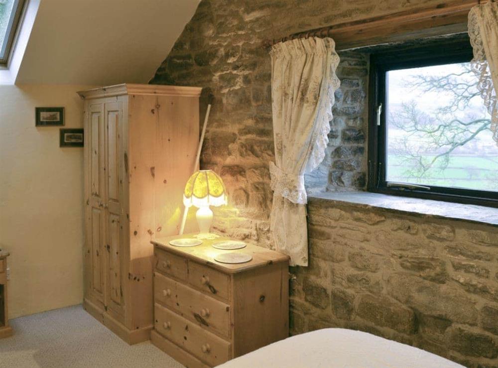 Ample storage within twin bedroom at Ladycroft Barn in Hope Valley, South Yorkshire