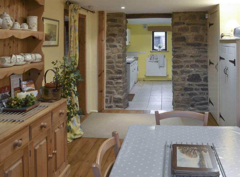 Open aspect to kitchen from dining room at Ladycroft Barn in Hope Valley, South Yorkshire