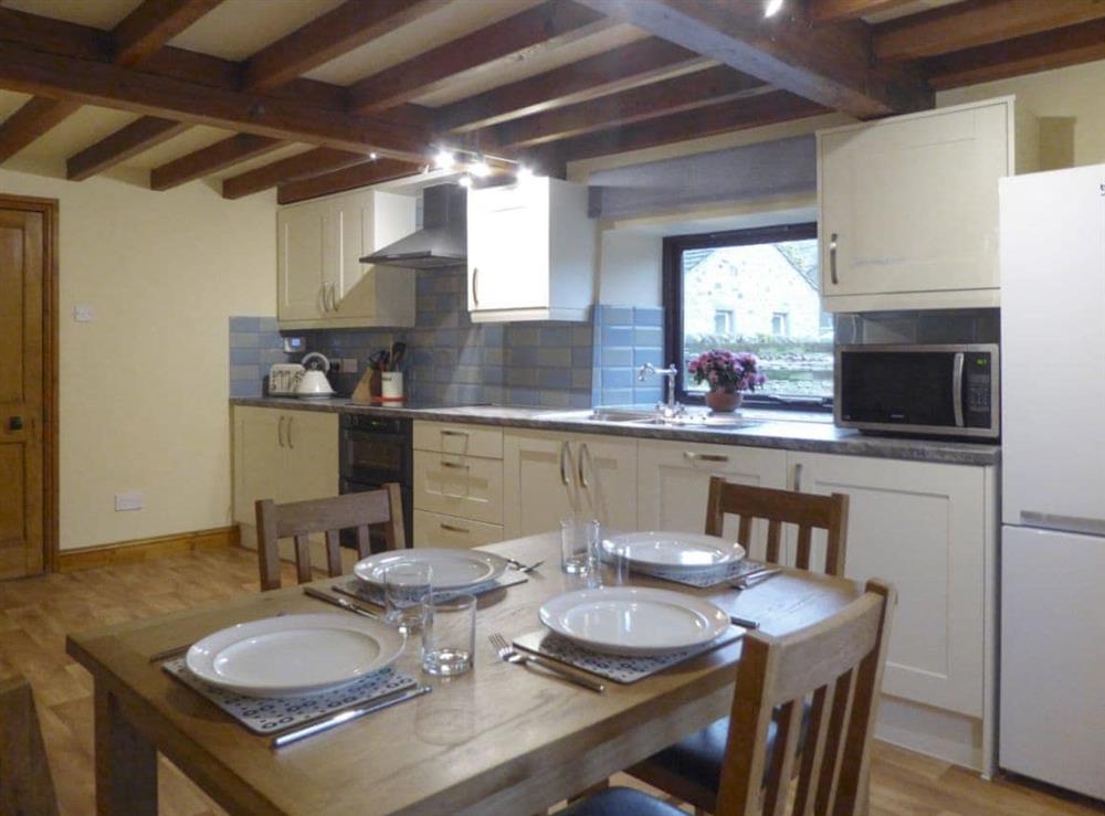 Spacious kitchen with convenient dining area at Ladycroft Cottage in Hebden, near Skipton, North Yorkshire