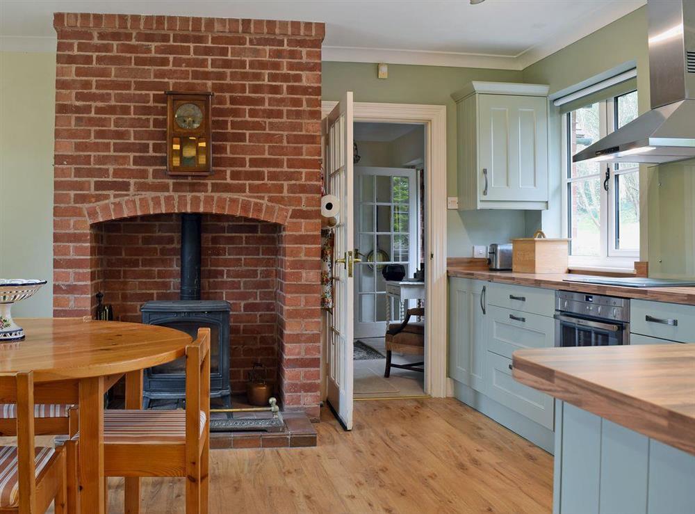 Well equipped kitchen/diner with wood-burning stove (photo 2) at Lady’s Field House in Pensax, Nr Tenbury Wells, Worcs., Worcestershire