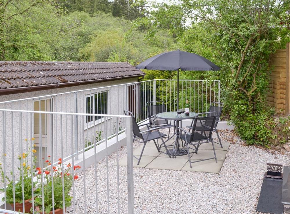 Patio area with outdoor furniture at Ladyvale Barn in Cardinham, near Bodmin, Cornwall
