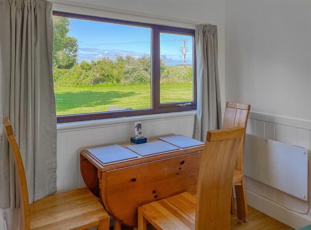Dining room at Laigh Isle Three in Kirkcudbright, Wigtownshire