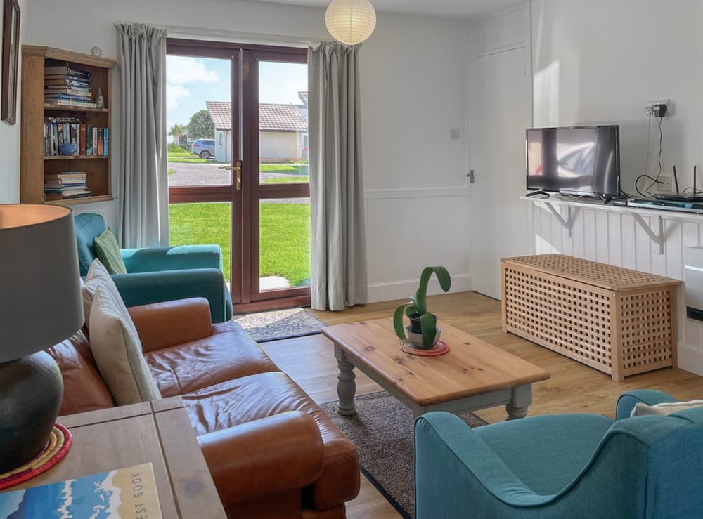 Living room at Laigh Isle Three in Kirkcudbright, Wigtownshire