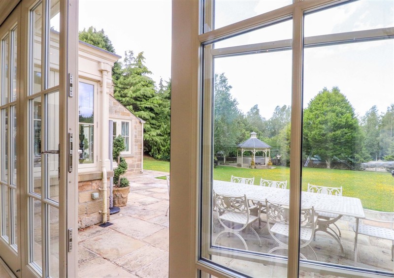 Enjoy a glass of wine on the patio at Laithe House, Burnley