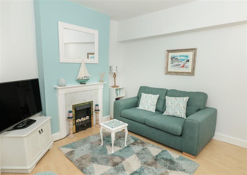Relax in the living area at Lake Victoria Cottage, Dartmouth