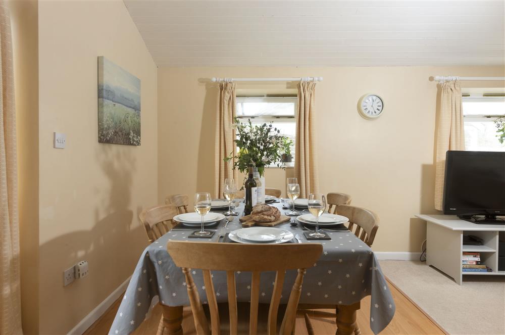 With a dining table seating six guests