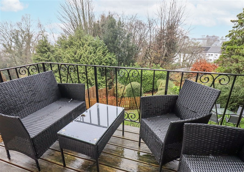 Enjoy a glass of wine on the patio at Lake View, Bowness-On-Windermere