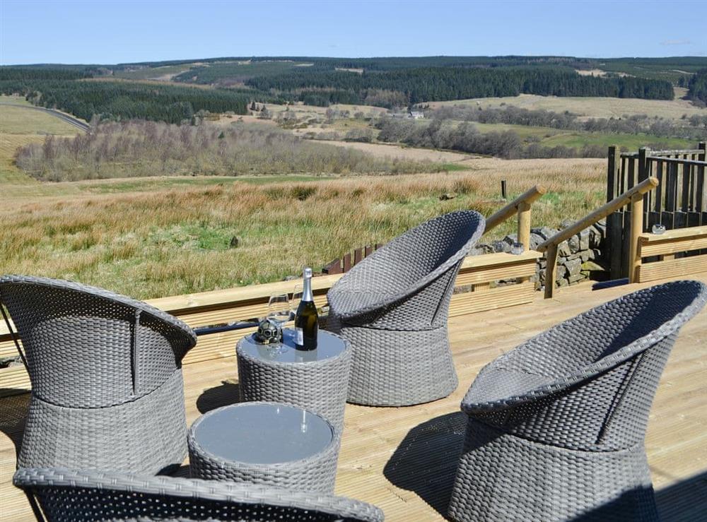 Decking area with seating & great views at Lake View Cottage in Yarrow Moor, near Bellingham, Northumberland