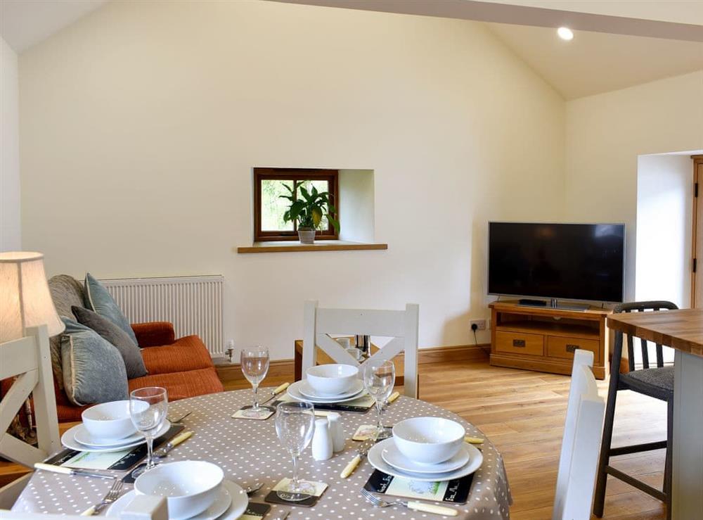 Open plan living space with wooden floor (photo 2) at Lake View Farm in Watermillock, near Penrith, Cumbria