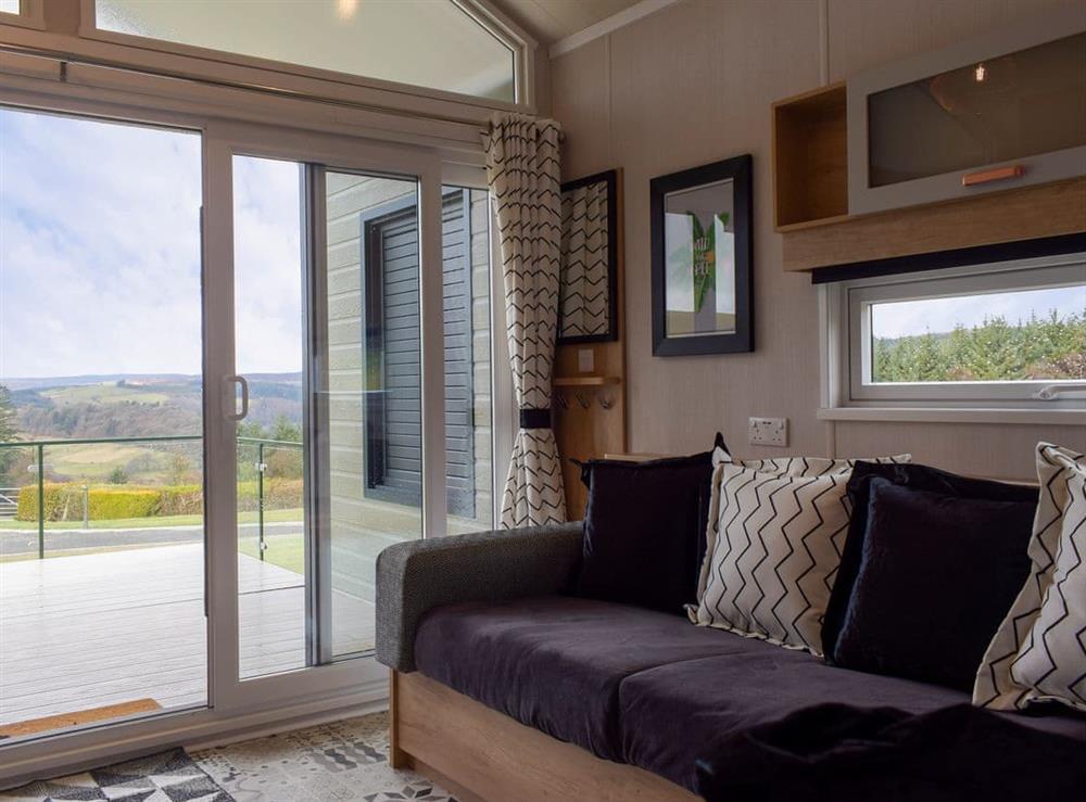 Living area at Lake Vyrnwy Luxury Glamping Pod 2 in Llanwddyn, Powys