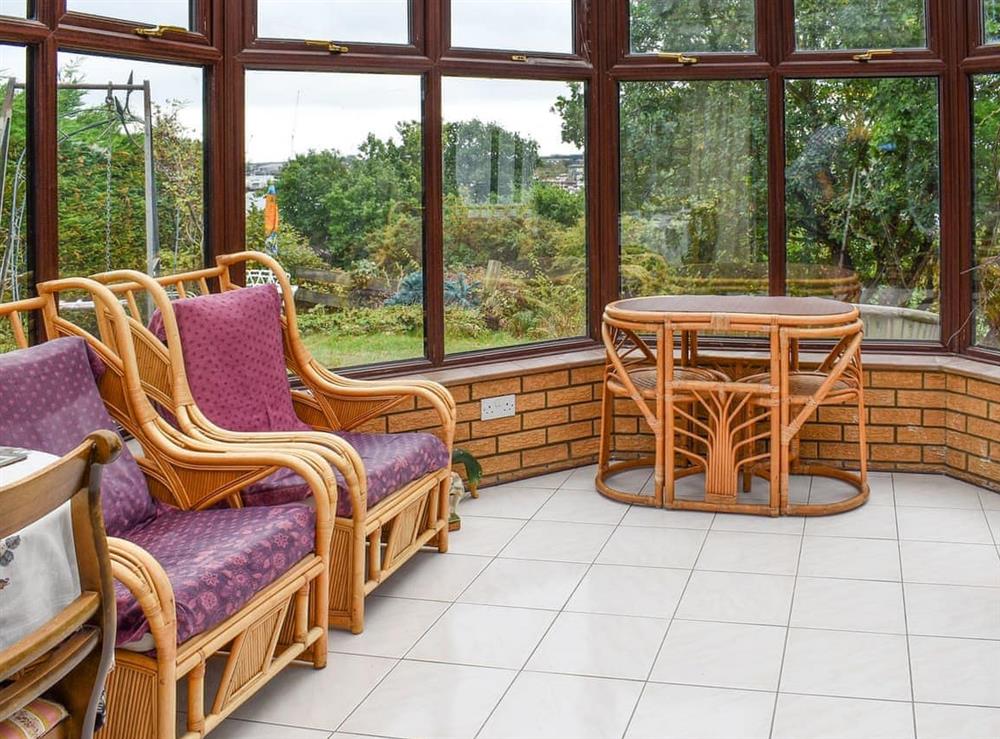 Sun room at Lakeland Bungalow in Oulton Broad, Suffolk