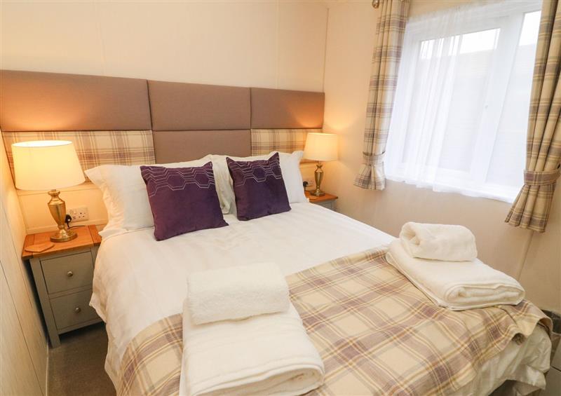 This is a bedroom at Lakeland Dream @ South Lakeland Leisure Lodge, Warton