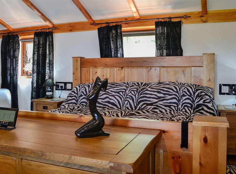 Beamed with wooden floor really making an impact at Swallow Cottage, 