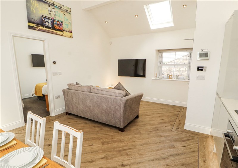 Relax in the living area (photo 2) at Lakes View Apartment 2, Carnforth