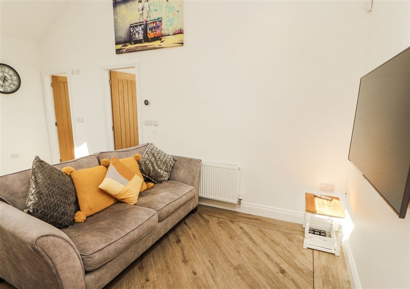Relax in the living area at Lakes View Apartment 2, Carnforth