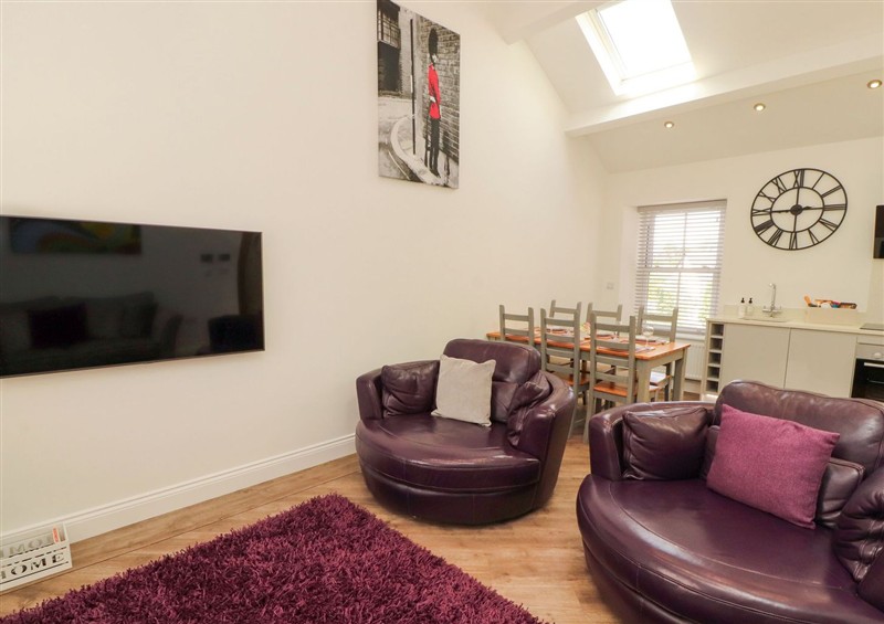 Relax in the living area (photo 3) at Lakes View Apartment 3, Carnforth