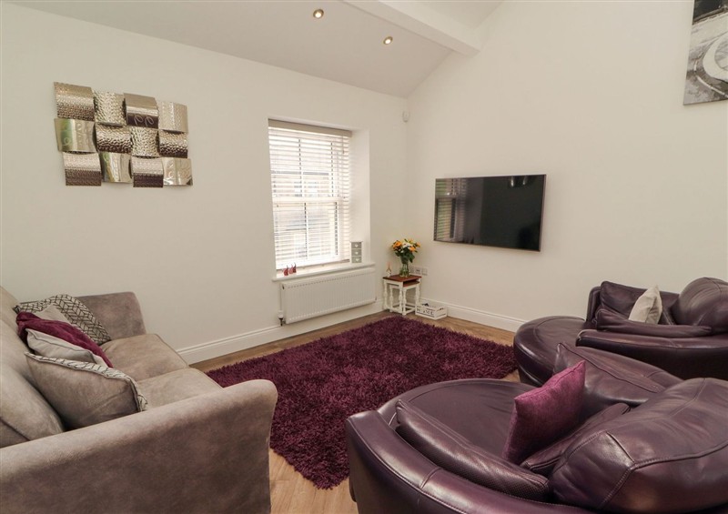 Relax in the living area at Lakes View Apartment 3, Carnforth