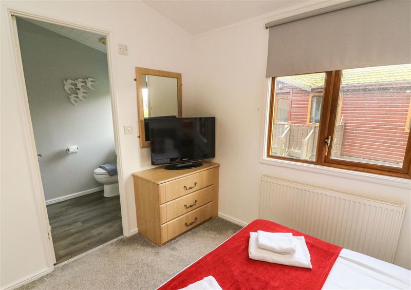 This is a bedroom at Lakeside 19, Carnforth near Tewitfield
