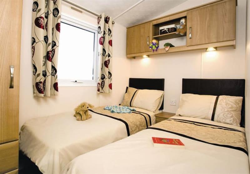 Twin bedroom in an Osprey 6 at Lakeside Holiday Park in Burnham-on-Sea, Somerset