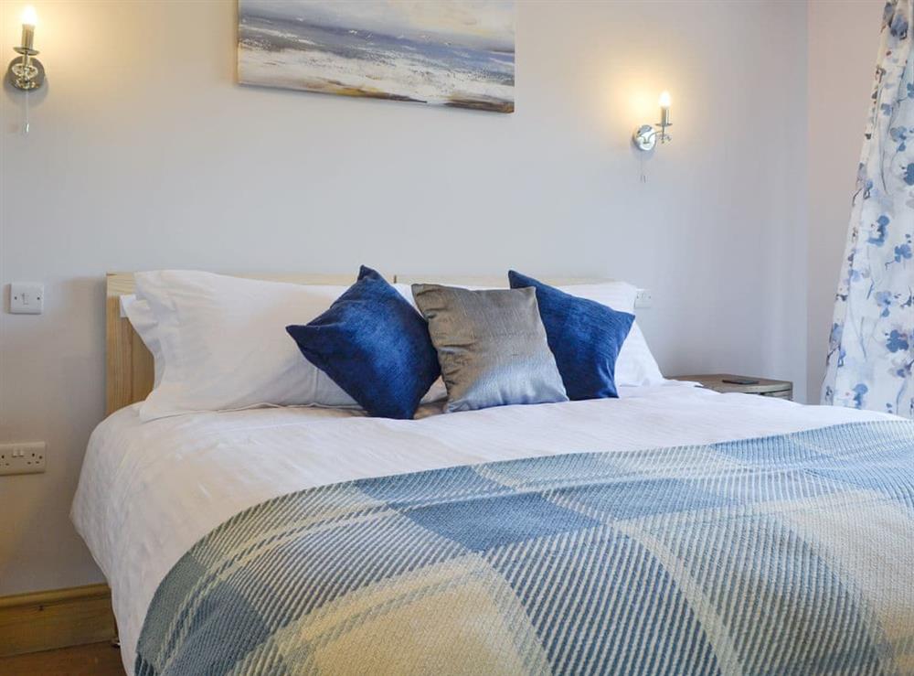 Comfortable double bedroom at Lakeside Lodge in near Rhayader, Powys