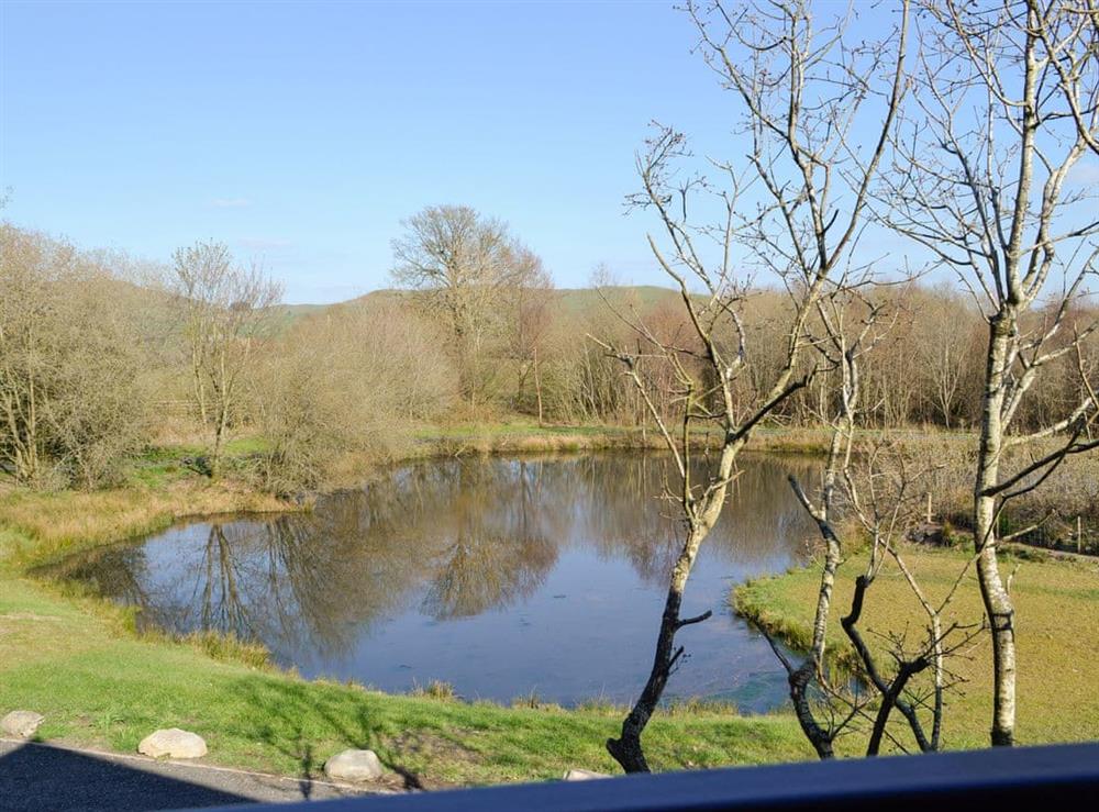 Lovely view from the master suite balcony at Lakeside Lodge in near Rhayader, Powys