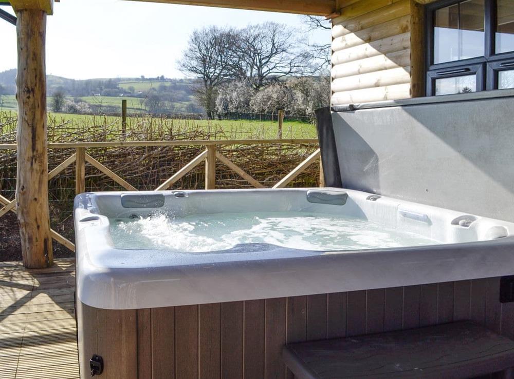 Luxurious hot tub on the decking at Lakeside Lodge in near Rhayader, Powys