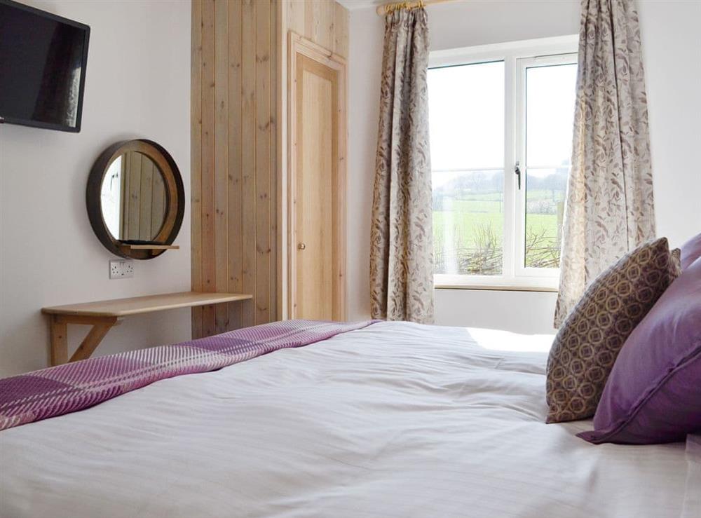 Peaceful double bedroom at Lakeside Lodge in near Rhayader, Powys