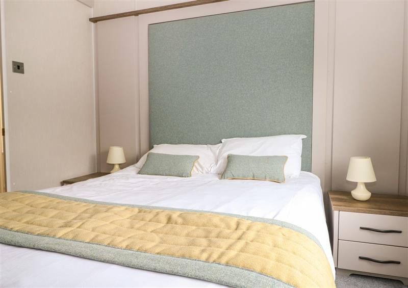 One of the bedrooms at Lakeside Lodge, Runcton