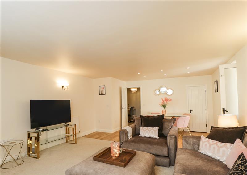 Enjoy the living room at Lakeside Mill Cottage, Longfords Mill near Nailsworth