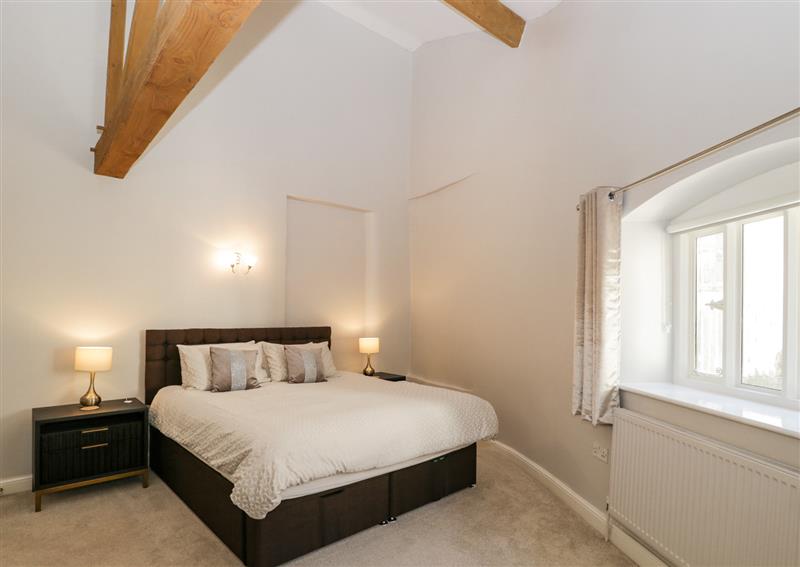 One of the 2 bedrooms at Lakeside Mill Cottage, Longfords Mill near Nailsworth