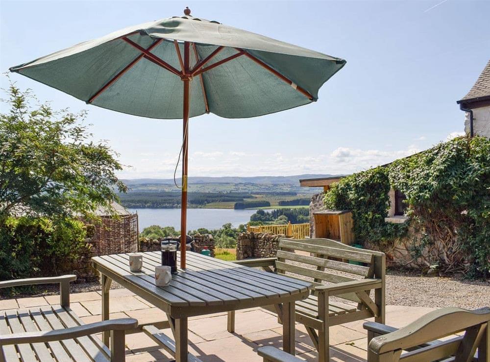 Lovely patio area with picturesque views at The Old Barn, 