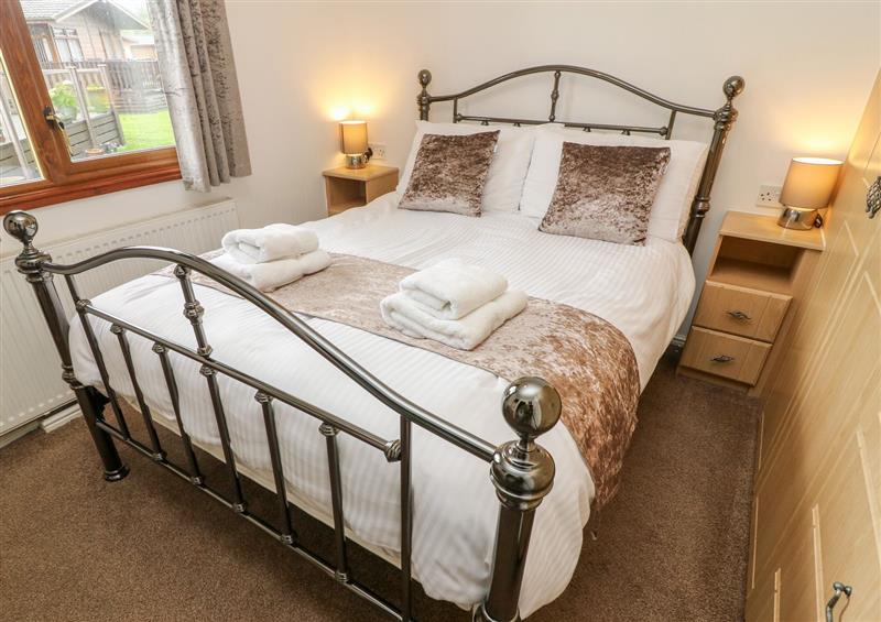 A bedroom in Lakeview Lodge at Lakeview Lodge, South Lakeland Leisure Village
