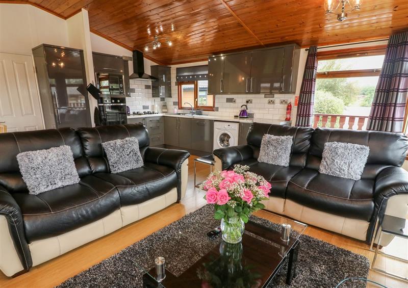 Relax in the living area at Lakeview Lodge, South Lakeland Leisure Village