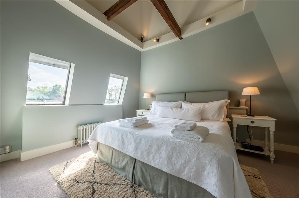 Bedroom four with 6’ super-king size bed at Lakeview Oast, Goudhurst