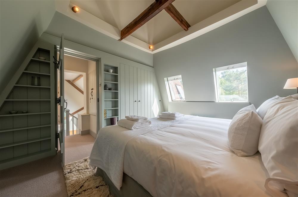 Bedroom four with a 6’ super-king size bed at Lakeview Oast, Goudhurst