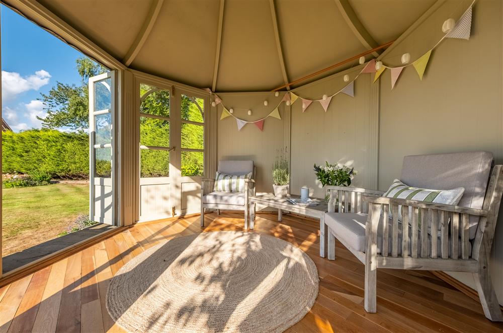 Enjoy the peace and quiet in the summer house at Lakeview Oast, Goudhurst