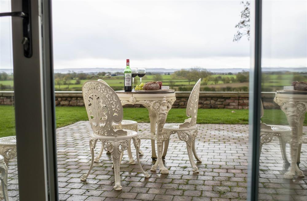 The french doors lead out to the patio area and garden at LaLo, Thirsk, North Yorkshire