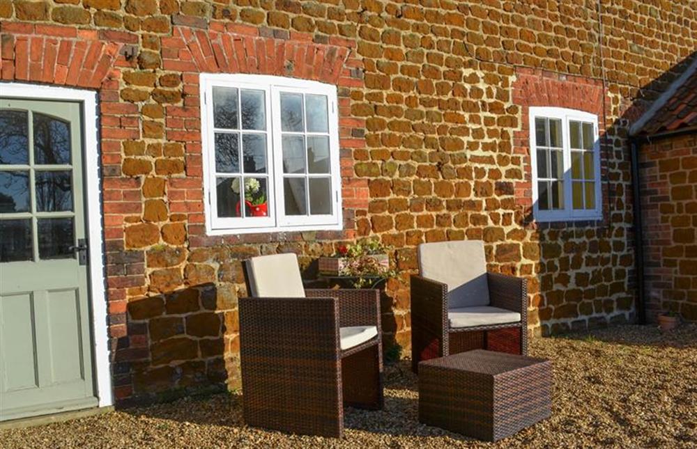 Front garden area with garden furniture at Lambert Cottage, Snettisham near Kings Lynn