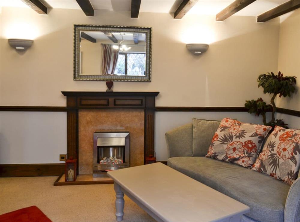 Sitting room with TV and sofa bed at Lambourne House in Skegness, Lincolnshire