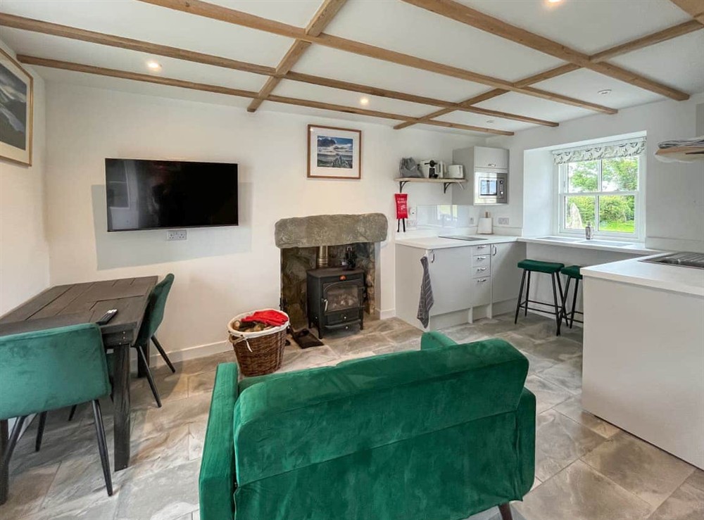 Kitchen/diner at Landberrick Farm Bothy in Whauphill, Wigtownshire
